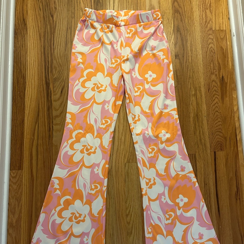 floral flare pants in pink and orange